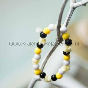 armband maken diy kralen zwart geel wit kwastje flosje