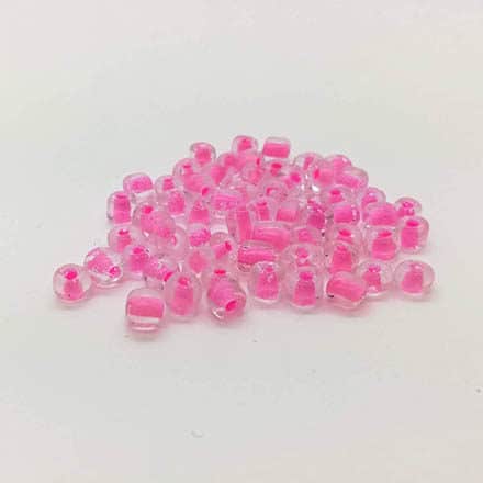 Rocailles kleine glaskraaltjes armbandjes rijgen zelf maken roze transparant