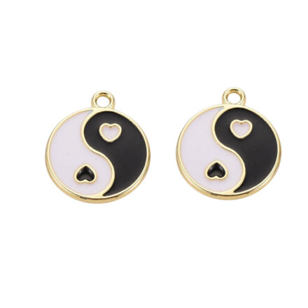 Yin yang bedel zwart wit goud metaal hartje