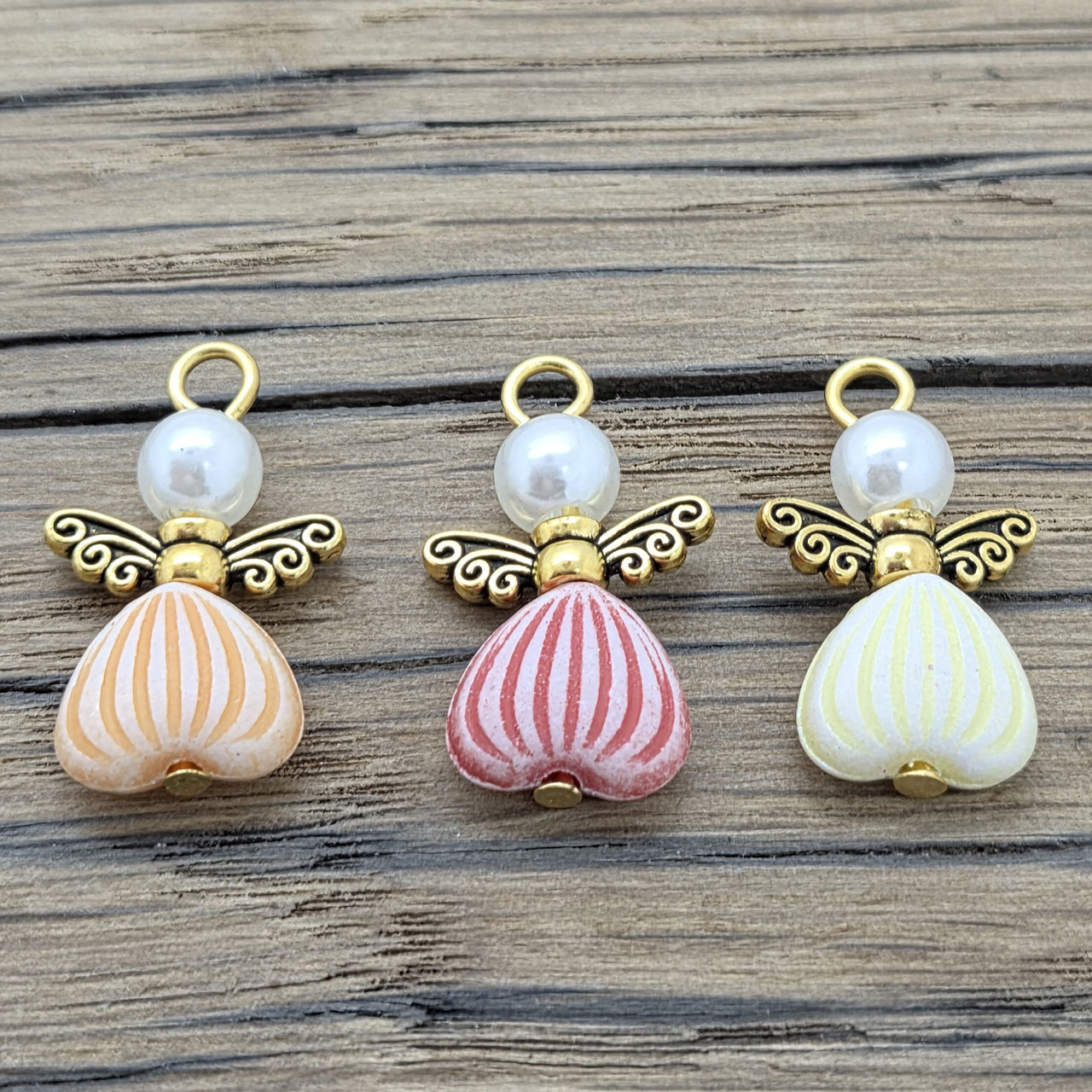 Geluksengeltjes gouden vleugeltjes rood oranje geel